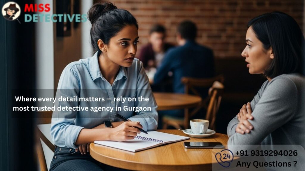 Two women sitting at a café table engaged in a serious discussion, with one taking notes in a notebook—capturing the discreet and professional client interaction typical of a trusted detective agency in Gurgaon.